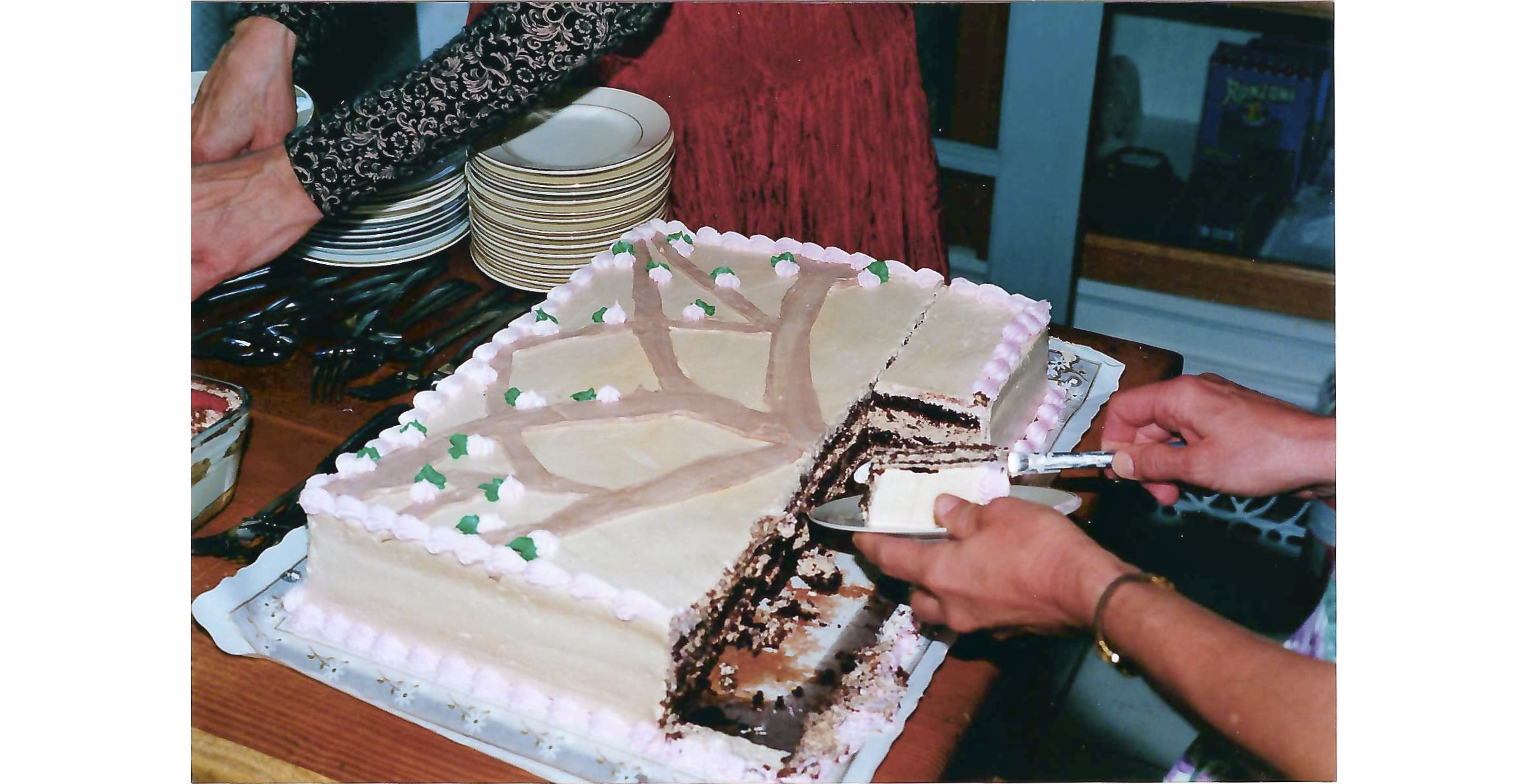 Photo of sheet cake with tree design frosting