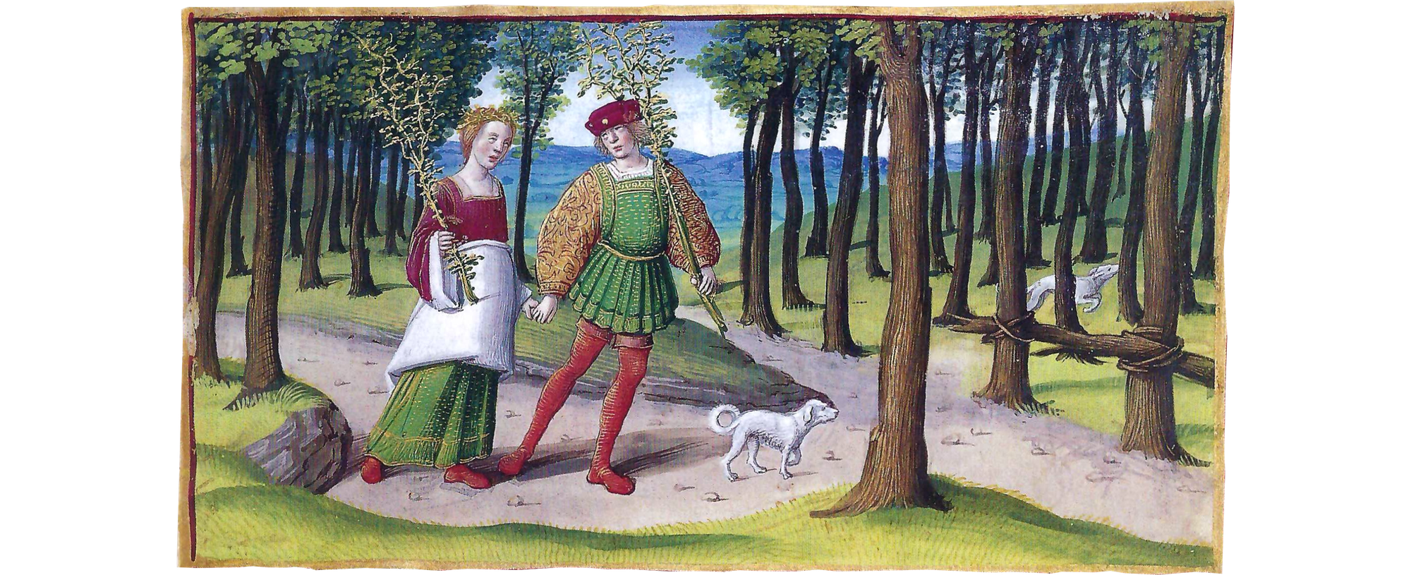 A young, well-dressed couple with a small white dog walk on a path among trees.