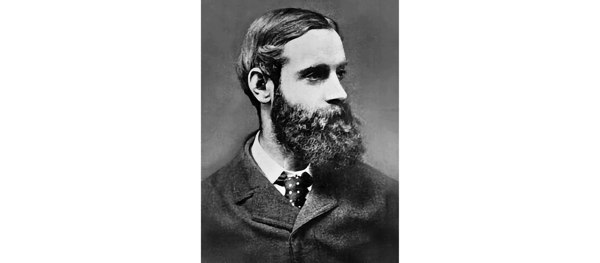 Photof of Randolph Caldecott, black and white, facing to right in profile with large beard.