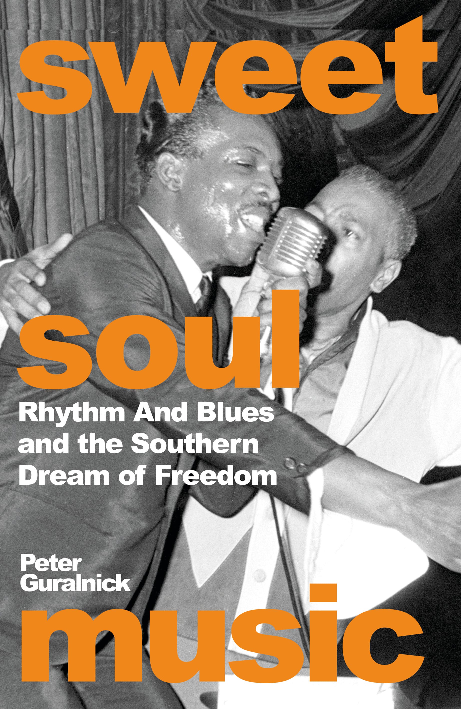 Image of cover of book showing closeup of two African American singers at a microphone